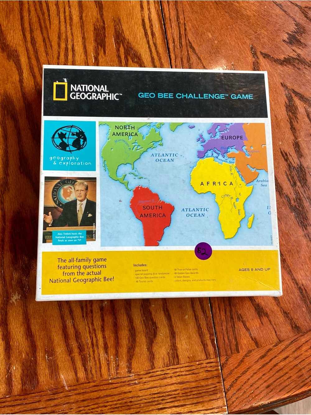 Alek Trebek National Geographic Geo Bee Challenge Game Black, Yellow, Blue, Red